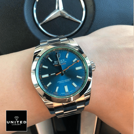 Rolex Milgauss 116400GV-0002 Blue Dial Replica 2 Rolex Milgauss 116400GV Green Crystal Oyster Replica on his arm and Mercedes logo on the back